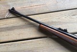 REMINGTON MODEL 7, IN THE LIGHT RECOIL 7MM-08 CAL, WALNUT STOCK
99+% COND. - 6 of 7