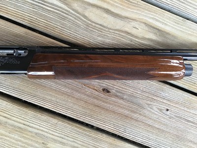 REMINGTON 1100SKEET-T 28 GA. 25” SKEET, HAS THE MOST OUTSTANDING FACTORY DELUXE FANCY HIGH GLOSS WALNUT WOOD YOU WILL EVER SEE ON A REMINGTON 1100 - Image 5 of 9