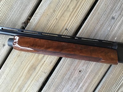 REMINGTON 1100SKEET-T 28 GA. 25” SKEET, HAS THE MOST OUTSTANDING FACTORY DELUXE FANCY HIGH GLOSS WALNUT WOOD YOU WILL EVER SEE ON A REMINGTON 1100 - Image 8 of 9