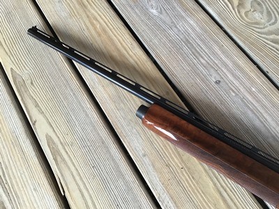 REMINGTON 1100SKEET-T 28 GA. 25” SKEET, HAS THE MOST OUTSTANDING FACTORY DELUXE FANCY HIGH GLOSS WALNUT WOOD YOU WILL EVER SEE ON A REMINGTON 1100 - Image 7 of 9
