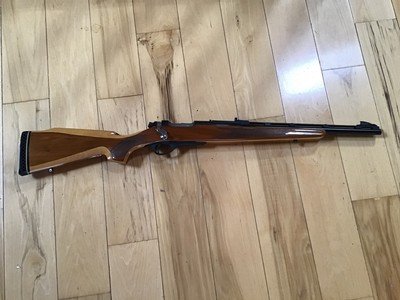 REMINGTON 600, 350 MAGNUM CAL., LAMINATED FACTORY STOCK, VENT RIB BARREL, 99% COND.