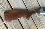 SAVAGE 24 DELUXE 22 LR. OVER 20 GA., HAS POPULAR SIDE BUTTON BARREL SELECTOR - 3 of 10