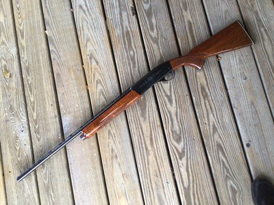 REMINGTON 1100 LW 28 GA. 25” VENT RIB, FULL CHOKE, MAHOGANY WOOD, EARLY MFG. PROBABLY 1969 OR 1970, 99% COND.