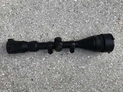 SIMMONS 4X-12X-44 VARIABLE, WIDE ANGLE, OUTSIDE OBJECTIVE, DUPLEX CROSSHAIRS, COMES WITH RINGS & MOUNT & BUTLER CREEK FLIP UP LENS PROTECTORS