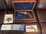 SMITH & WESSON 27-2, RARE 5” BARREL, BRIGHT NICKEL, NEW UNFIRED 100% COND. IN THE SMITH & WESSON WOODEN PRESENTATION CASE WITH OWNERS MANUAL ETC. - Image 3 of 6