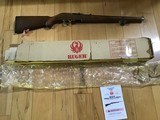 RUGER 10-22, 22LR. INTERNATIONAL CHECKEREDMANLICHER WALNUT STOCK, STAINLESS STEEL, NEW UNFIRED IN THE BOX WITH OWNERS MANUAL, ETC. - Image 1 of 9
