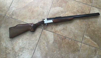 SAVAGE 24 DELUXE 22 LR. OVER 20 GA. GOLD TRIGGER, SATIN SILVER ENGRAVED WITH RED FOX ON ONE SIDE & GROUSE IN FLIGHT ON OTHER SIDE, EXC. COND. - Image 1 of 8