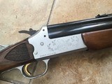 SAVAGE 24 DELUXE 22 LR. OVER 20 GA. GOLD TRIGGER, SATIN SILVER ENGRAVED WITH RED FOX ON ONE SIDE & GROUSE IN FLIGHT ON OTHER SIDE, EXC. COND. - Image 3 of 8
