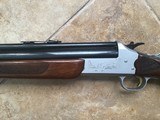 SAVAGE 24 DELUXE 22 LR. OVER 20 GA. GOLD TRIGGER, SATIN SILVER ENGRAVED WITH RED FOX ON ONE SIDE & GROUSE IN FLIGHT ON OTHER SIDE, EXC. COND. - Image 7 of 8