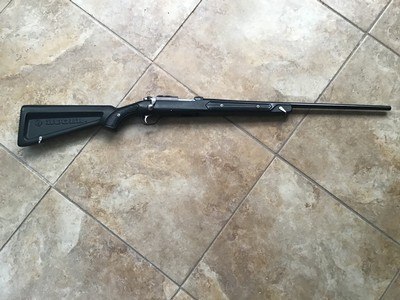 RUGER 77 17 HMR CAL. WITH BOAT PADDLE STOCK 99% COND. - Image 1 of 8