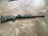REMINGTON 7, 243 CAL. FACTORY YOUTH LADIES CAMO, 18” BARREL, 13 3/8” LOP. 99+++% COND.