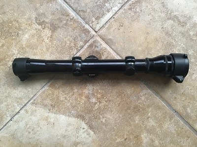 REDFIELD 2X 1” TUBE RIFLE SCOPE WITH FINE CROSS HAIRS RETICLE, COMES WITH REDFIELD RINGS, HAS FLIP UP SEE THRU LENS COVERS, NEW COND. - Image 1 of 3