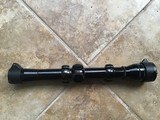 REDFIELD 2X 1” TUBE RIFLE SCOPE WITH FINE CROSS HAIRS RETICLE, COMES WITH REDFIELD RINGS, HAS FLIP UP SEE THRU LENS COVERS, NEW COND. - Image 3 of 3