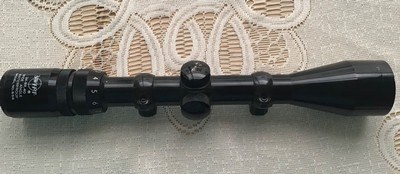 SWIFT MODEL 656, 3X-9X-40, WIDE ANGLE DUPLEX RETICLE WATER PROOF, CLEAR GLASS, ONLY MARKS ARE ON THE ADJUSTMENT COVERS - Image 1 of 2
