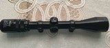 SWIFT MODEL 656, 3X-9X-40, WIDE ANGLE DUPLEX RETICLE WATER PROOF, CLEAR GLASS, ONLY MARKS ARE ON THE ADJUSTMENT COVERS