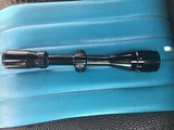 BUSHNELL SPORTSMAN 4X-12X AO, DUPLEX CROSS HAIS RETICLE, WATERPROOF, AS NEW INSIDE & OUT - Image 2 of 3