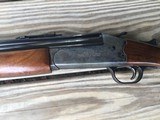 SAVAGE 24, 22 MAGNUM OVER 410 GA.,POPULAR SIDE BUTTON BARREL SELECTOR, CASE COLOR RECEIVER, WALNUT WOOD, 98% COND. - 4 of 8
