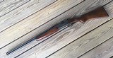 SAVAGE 24, 22 MAGNUM OVER 410 GA.,POPULAR SIDE BUTTON BARREL SELECTOR, CASE COLOR RECEIVER, WALNUT WOOD, 98% COND. - 1 of 8