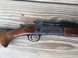 SAVAGE 24, 22 MAGNUM OVER 410 GA.,POPULAR SIDE BUTTON BARREL SELECTOR, CASE COLOR RECEIVER, WALNUT WOOD, 98% COND. - 6 of 8