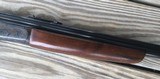 SAVAGE 24, 22 MAGNUM OVER 410 GA.,POPULAR SIDE BUTTON BARREL SELECTOR, CASE COLOR RECEIVER, WALNUT WOOD, 98% COND. - 7 of 8