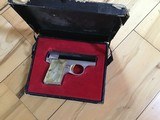 BROWNING BABY 25 FACTORY BRIGHT NICKEL WITH PEARLITE GRIPS NEW IN THE BROWNING BOX WITH OWNERS MANUAL - Image 2 of 3