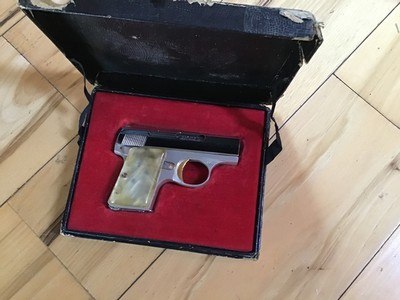 BROWNING BABY 25 FACTORY BRIGHT NICKEL WITH PEARLITE GRIPS NEW IN THE BROWNING BOX WITH OWNERS MANUAL - Image 2 of 3