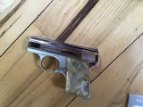 BROWNING BABY 25 FACTORY BRIGHT NICKEL WITH PEARLITE GRIPS NEW IN THE BROWNING BOX WITH OWNERS MANUAL - Image 3 of 3