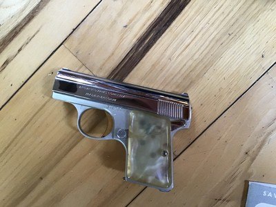 BROWNING BABY 25 FACTORY BRIGHT NICKEL WITH PEARLITE GRIPS NEW IN THE BROWNING BOX WITH OWNERS MANUAL - Image 3 of 3