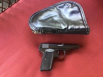 BROWNING BELGIUM 1955, 380 CAL., IN BROWNING RED INSERT ZIPPER CASE THAT BROWNING APPEARS UNFIRED 99+++% COND. - Image 1 of 4