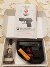 RUGER LCP .380 PISTOL WITH 1 MAG (6+1) AND ZIPPERED POUCH W/RUGER LOGO NEW-IN-BOX - 1 of 9