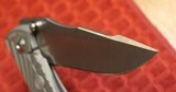 Wilson Tactical® / Chris Reeve Knives - Star-Tac Titanium Framelock "The Umnumzaan" - 24 of 25