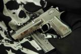 Desert Eagle 50AE
Custom polished Stainless Steel collectors edition - 3 of 9