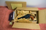 Smith & Wesson Model 25-3.45 ColtUnfired In Factory Pack - 1 of 2