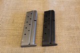 Two .9mm Colt Commander 9 round magazines - 1 of 4