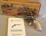 Never fired Uberti 1873 Limited Ed Engraved Cattleman Revolver NM Stainless Steel .45 Colt, 4.75”, Pearl Style Grip, Stainless Finish - 1 of 23
