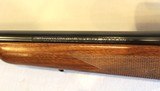 Winchester Model 70 Super Grade in .338 Win Mag with Leupold scope - 13 of 21