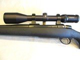 Custom Sako L691 in .375 H&H with Swarovski scope, 24