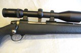 Custom Sako L691 in .375 H&H with Swarovski scope, 24