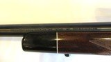 Remington Model 700 in 7mm Rem Ultra Mag with Leupold VX-1 4-12x40mm scope - 16 of 20