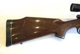 Remington Model 700 in 7mm Rem Ultra Mag with Leupold VX-1 4-12x40mm scope - 2 of 20