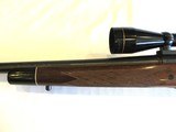 Remington Model 700 in 7mm Rem Ultra Mag with Leupold VX-1 4-12x40mm scope - 15 of 20