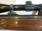 Remington Model 700 in 7mm Rem Ultra Mag with Leupold VX-1 4-12x40mm scope - 14 of 20