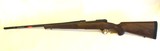 Like New Winchester Repeating Arms Model 70 Featherweight Full Size 300 WSM 3+1 24