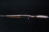 Mossberg 4x4 .338 Win Mag - 3 of 8