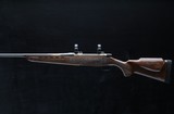 Mossberg 4x4 .338 Win Mag - 1 of 8