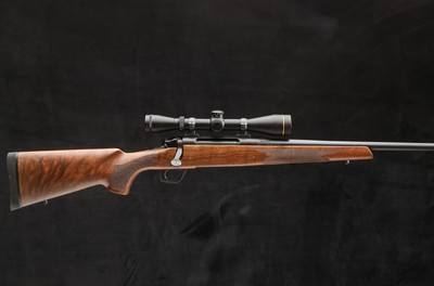 Remington 787 7mm Rem Mag bolt-action rifle with Leupold scope