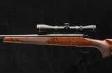Remington 787 7mm Rem Mag bolt-action rifle with Leupold scope - 4 of 8