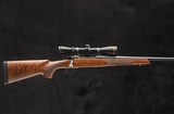 Remington 787 7mm Rem Mag bolt-action rifle with Leupold scope