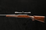 Remington 787 7mm Rem Mag bolt-action rifle with Leupold scope - 3 of 8