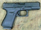 GLOCK Model G19 Gen 5 Pistol, 9mm Cal., with MOS Sight Bases - 1 of 12